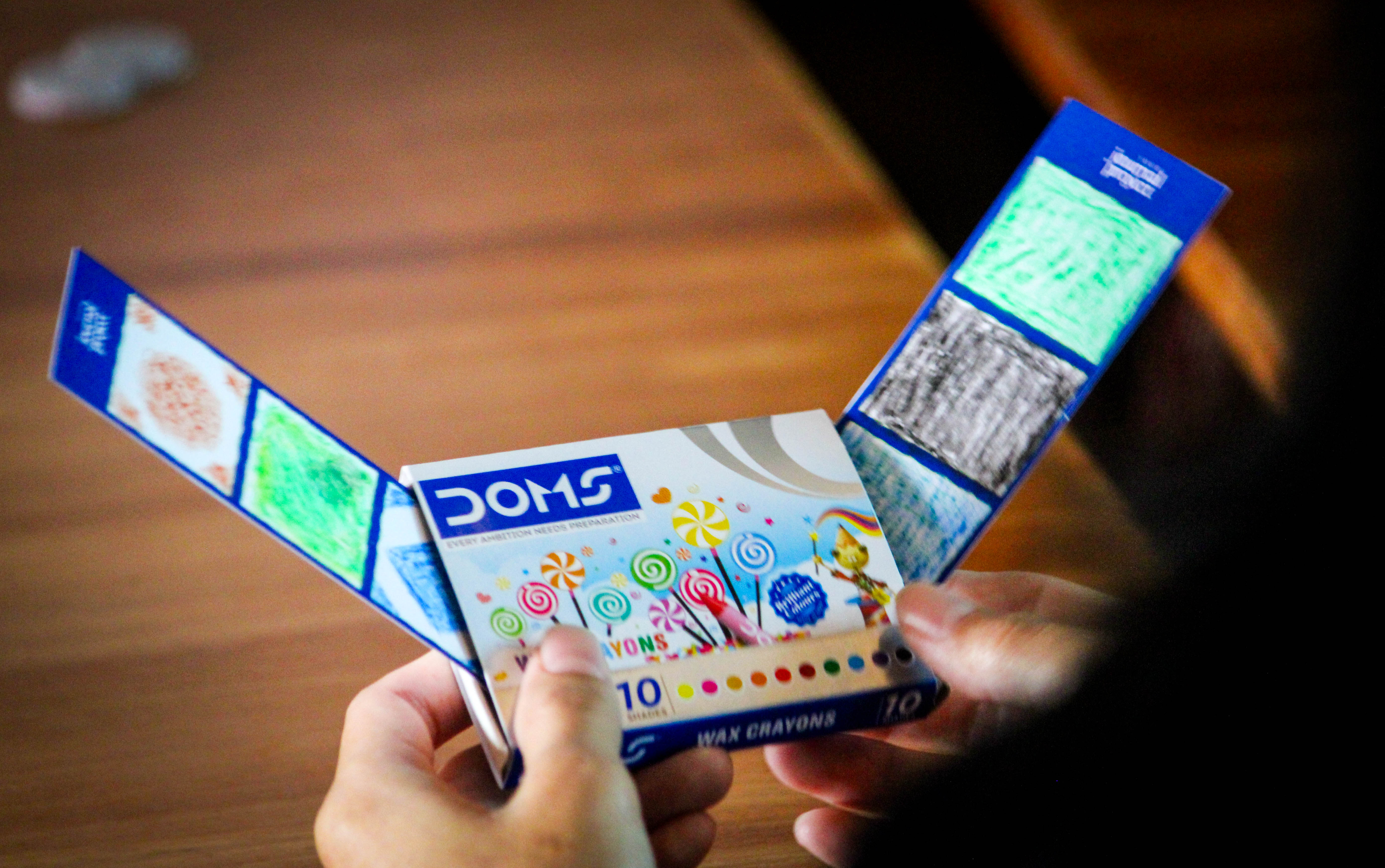 People colouring bookmarks after the screening.